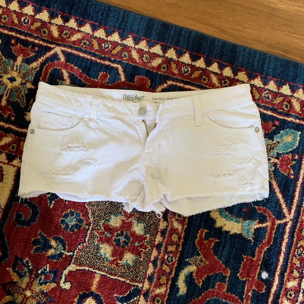 White distressed jean shorts